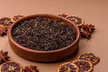 Golden black tea, dried leaves of a Chinese or Indian breakfast drink. Black tea dried leaves