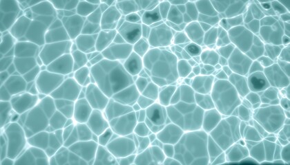 Obraz premium The mesmerizing pattern of light reflecting on the surface of clear turquoise water.