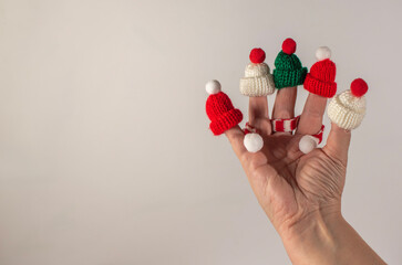 New Year's hats on fingers