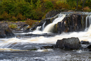 A beautiful Quebec waterfall in the fall colors