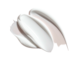 Creamy, light-beige cosmetic product smudged, swirled, and smeared in a soft,  natural light