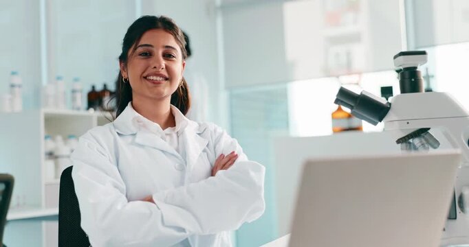 Happy woman, face or forensic scientist with laptop for medical research or study at laboratory. Portrait, female person or smile with arms crossed in confidence for microbiology, exam or development