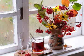 a bouquet of autumn flowers and leaves