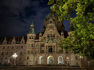 Naklejka premium The New Town Hall in Hannover, Germany Illuminated at Night