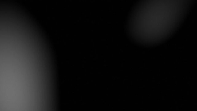 Monochrome dark gradient animation background with lens flare