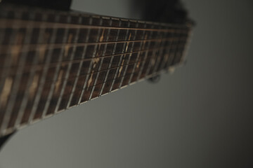 Creative moment captured on guitar strings with a unique angle and soft lighting