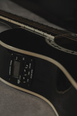 Acoustic guitar resting on a soft surface ready for a melodic session