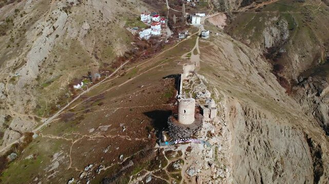 Aerial view of ancient genoese fortress ruins overlooking balaklava bay. Media