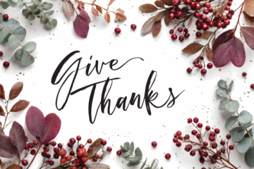 Give Thanks calligraphy with autumn leaves and berries decorative seasonal design for Thanksgiving cards and holiday greetings isolated on white background