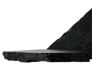 Dark, textured stone platform angled against a black backdrop