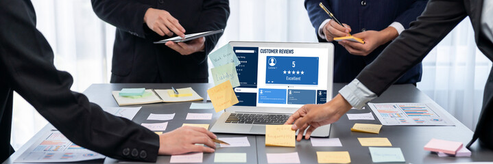 Analyst team use sticky note for creative and analytic brainstorm for business idea with BI data dashboard on laptop screen. Analysis financial data visualization tech for marketing strategy. Prodigy