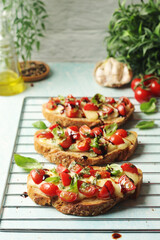 Freshly made bruschetta sandwiches - traditional dish of Italian cuisine	
