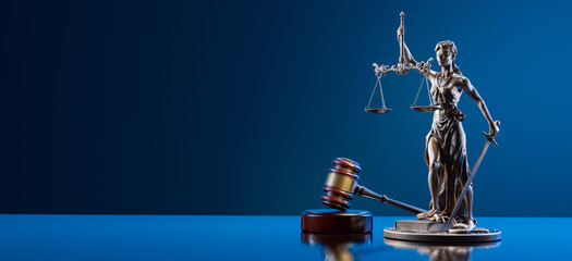 Legal Concept: Themis is the goddess of justice and the judge's gavel hammer as a symbol of law and order