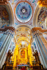 Krakow, Poland. Baroque style Church of St. Anne interior in old town. Featuring elaborate...