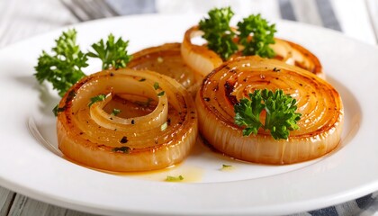 Delicious caramelized onion rings with parsley garnish on a white plate