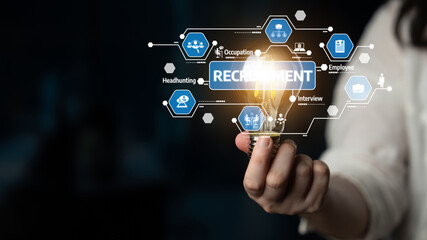 Fototapeta premium Discover innovative recruitment strategies highlighted by a glowing light bulb, symbolizing fresh ideas in the digital hiring landscape focused on effective candidate engagement. Tessel