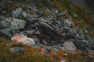 Dark Textured Rocks and Scree on a Steep Mountain Slope