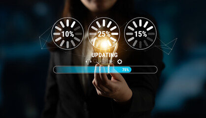 A concept of a system update and software installation. A progress bar and loading icons showing...