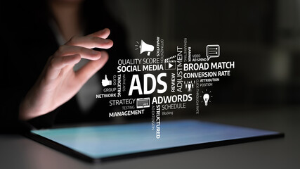 A businessperson engages with a digital representation of marketing concepts on a touchscreen tablet, illuminating strategies for effective online advertising. Tessel