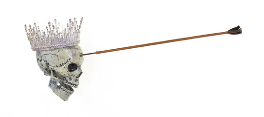 Arrow in a skull with a crown isolated on white background