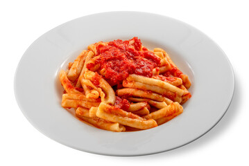 Caserecce Italian macaroni pasta topped with red tomato sauce on  white plate isolated