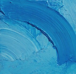 Close-up view of textured, vibrant blue paint strokes