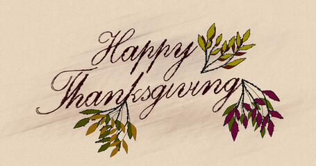 Calligraphy ink greeting for Thanksgiving with colorful leaves on paper