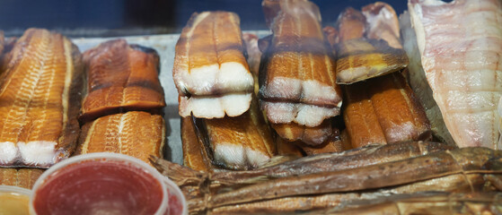 Fish market. A display case with a variety of fish products.