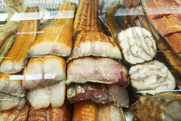 A display case with a wide range of processed fish.