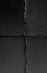 close-up of black paper with printed fold creases and a single hair lying across the surface. The textured paper overlay creates a realistic worn and distressed look, perfect for adding vintage effect