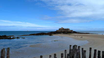 Fort National and Wooden Breakwater Poles at Low Tide, Saint-Malo, France