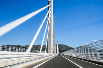 Speeding across Pelje&scaron;ac Bridge Croatia scenic cable stayed highway fast driving