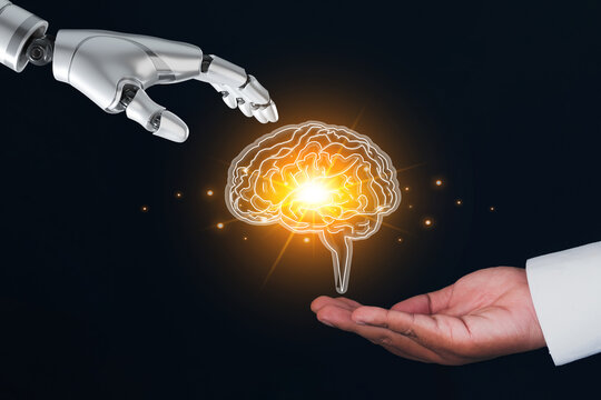 Robot hand giving a glowing brain to a human. Metaphor for AI development, deep learning, data processing, creating new intelligence, and the synergy between man and machine on a dark background. - Powered by Adobe