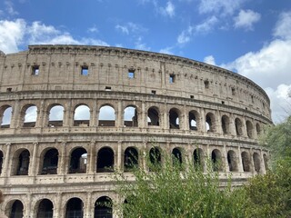Fototapeta premium The iconic Colosseum in Rome, Italy, captured in stunning detail. The image showcases the grandeur and historical architecture of this ancient amphitheater, perfect for illustrating travel, history, a