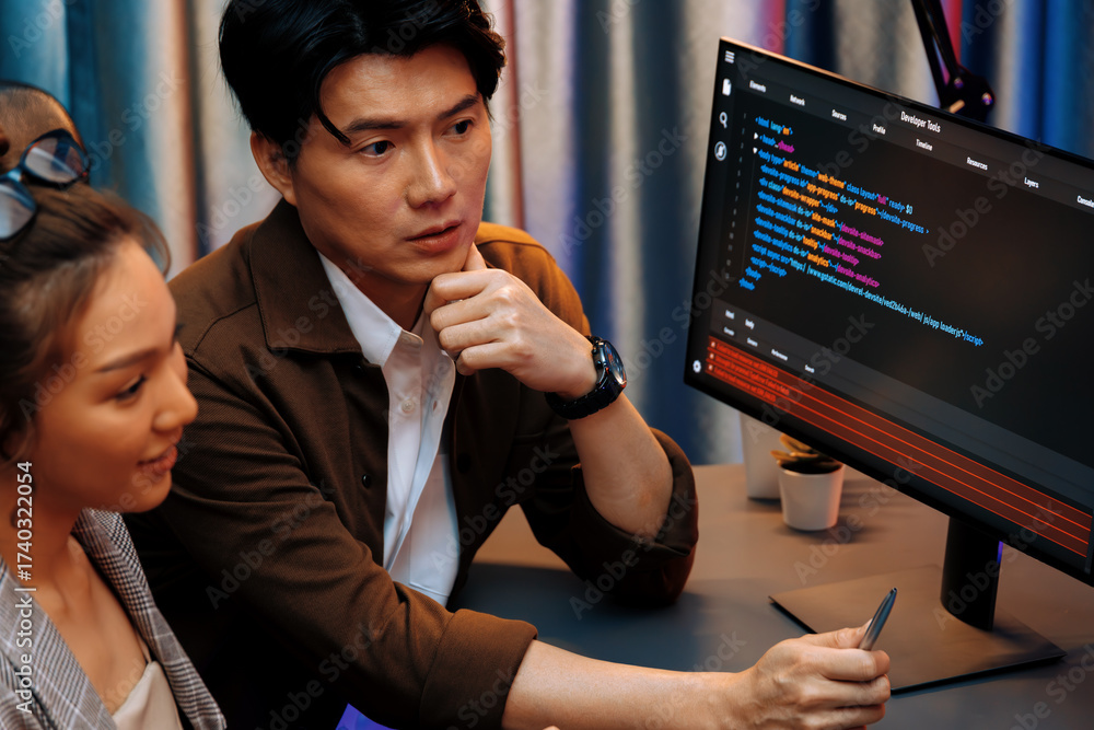 Wall mural it developers discussing with point to intelligent website development coder system running data onl