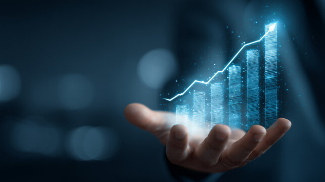 Business Hand Presenting Glowing Upward Bar Chart Representing Financial Growth
