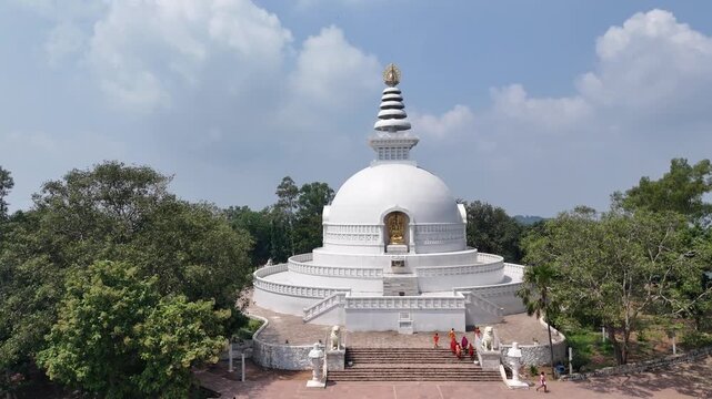 Vishwa Shanti Stupa in Rajgir, Bihar &ndash; a majestic white domed peace pagoda built by the Japanese, symbolizing global harmony, spirituality, and serenity, set atop scenic Ratnagiri hills.