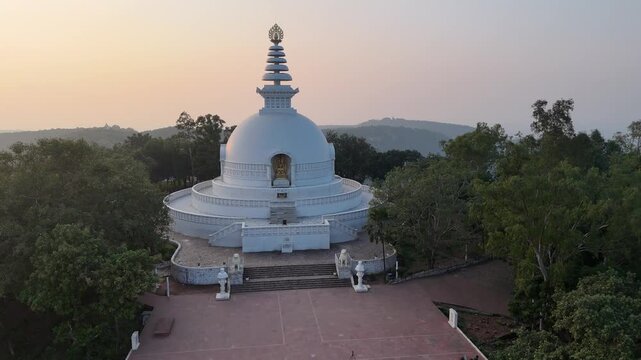 Vishwa Shanti Stupa in Rajgir, Bihar &ndash; a majestic white domed peace pagoda built by the Japanese, symbolizing global harmony, spirituality, and serenity, set atop scenic Ratnagiri hills.