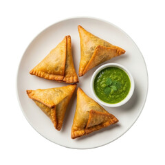 Four Golden Brown Samosas with Green Chutney on a White Plate against Transparent Background