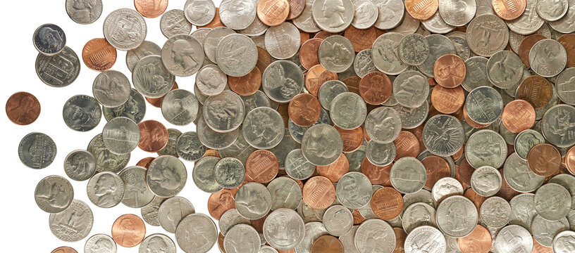 A large display of pennies, nickels, dimes and quarters in circulation on a transparent background..
