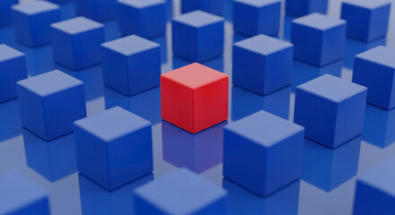 Obraz premium Bright Red Cube Stands Out Among Many Blue Cubes In A Patterned Grid