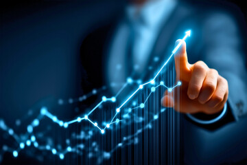 Businessman Touching Rising Blue Graph for Financial Growth