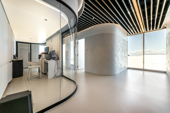 Modern dental office interior with reception desk, patient chairs, treatment rooms and professional equipment. Bright clean environment designed for healthcare and dentistry services, including x-ray 