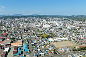 Obraz premium Aerial View of Kitami City 北見市 and Muka River 無加川, Hokkaido 北海道, Japan