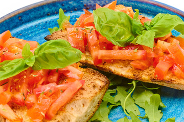 Italian bruschetta with fresh tomatoes, basil, and crusty bread