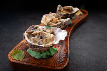 Baked rapa whelk with cheese