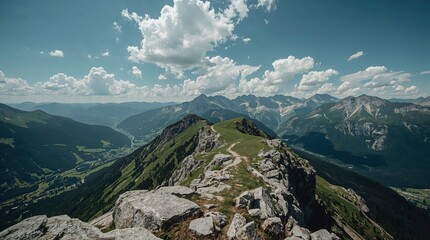 Fototapeta premium High mountain ridge hiking trail overlooking vast rugged valley