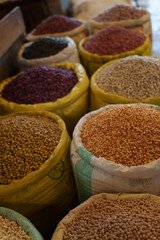 Bulk seeds and grains in sacks at market