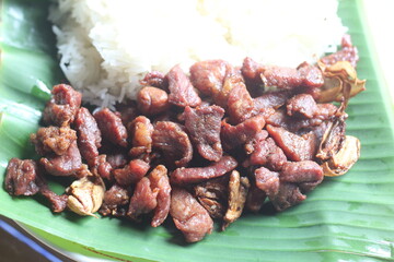 Fried pork with garlic and sticky rice