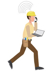 モバイル機器を使って忙しく働くエンジニア。